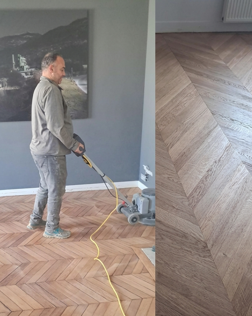Artisan ponçant un parquet à la ponceuse à bande